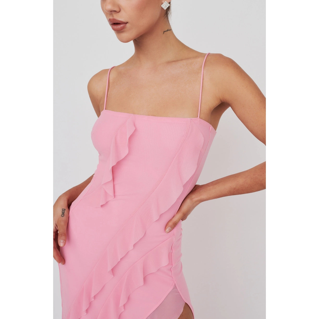 kylie dress pink Kylie Jenner Wore an Ode to Barbie in a Plunging Pink Vinyl Dress